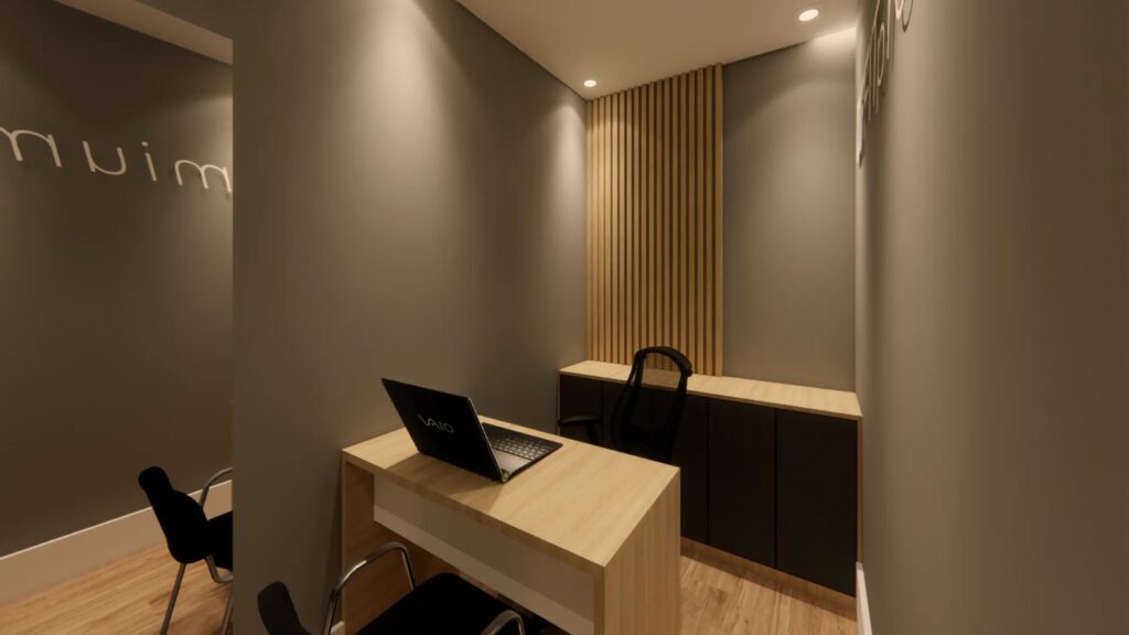 Sala de atendimento da DF Premium com mesa, computador e painel ripado